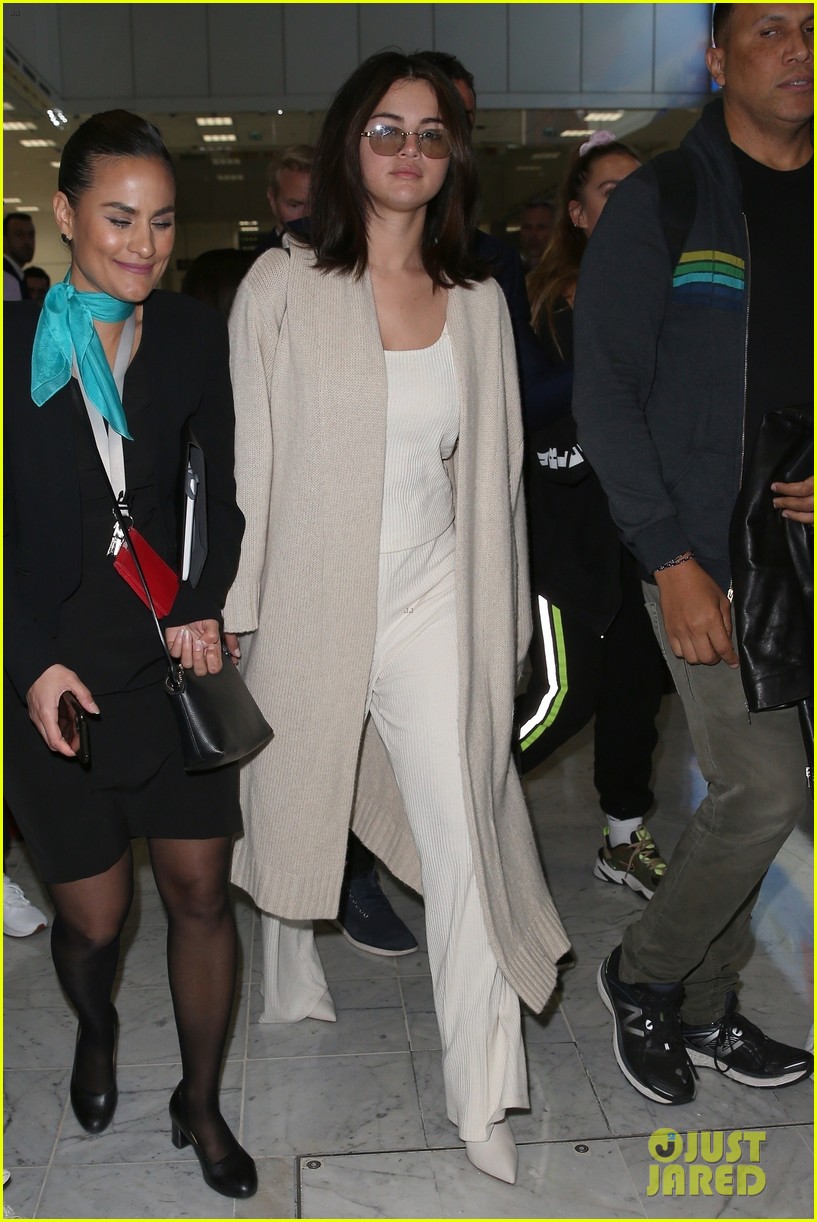 Full Sized Photo of selena gomez arrives at airport for cannes 12