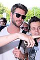 miley cyrus liam hemsworth swarmed by fans in poland 08