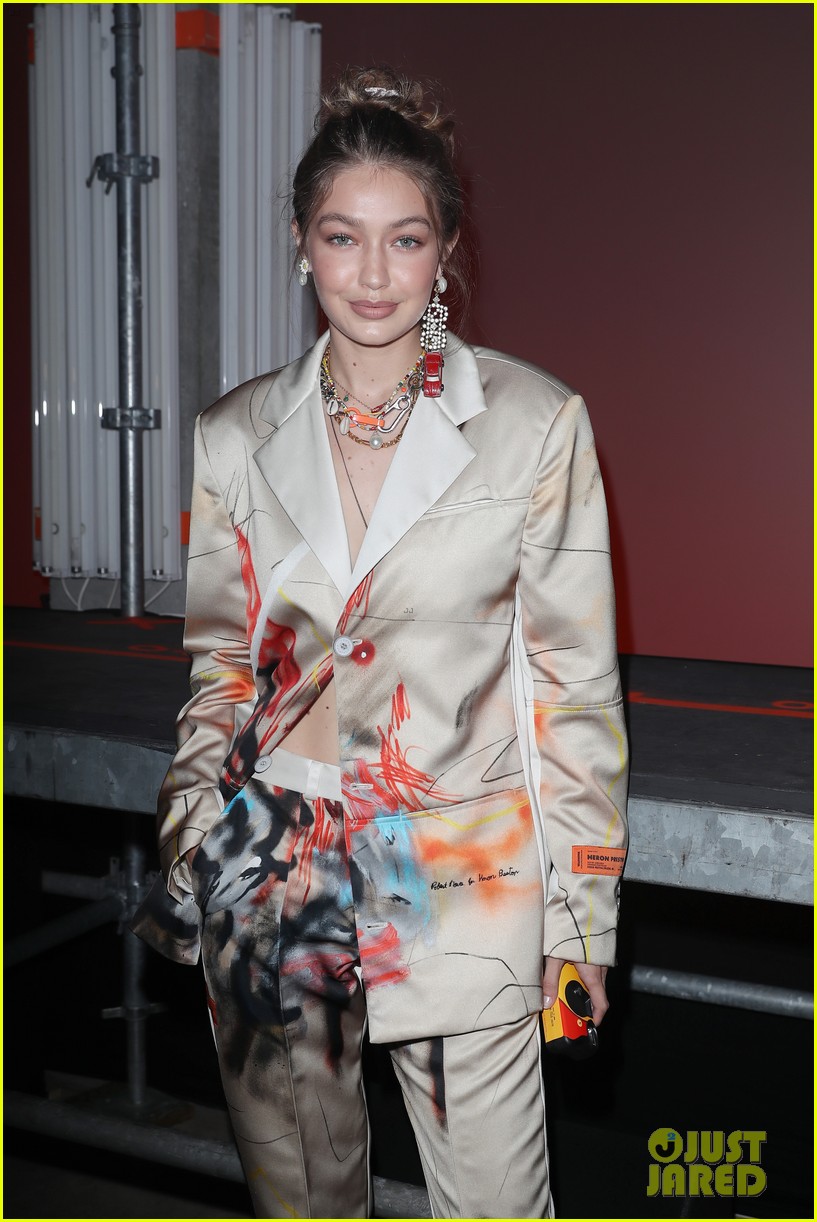 Gigi Hadid Brings Disposable Camera to Heron Fashion Show in Paris ...