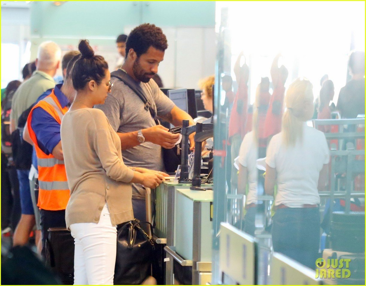 Shay Mitchell Pregnant-Barcelona Airport - CelebVegas