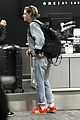 kristen stewart dons double denim for flight out of lax 04