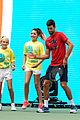 meg donnelly austin mahone hit the stage for arthur ashe kids day 04