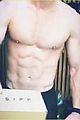 liam hemsworth goes shirtless bares six pack while working out with chris hemsworth 03