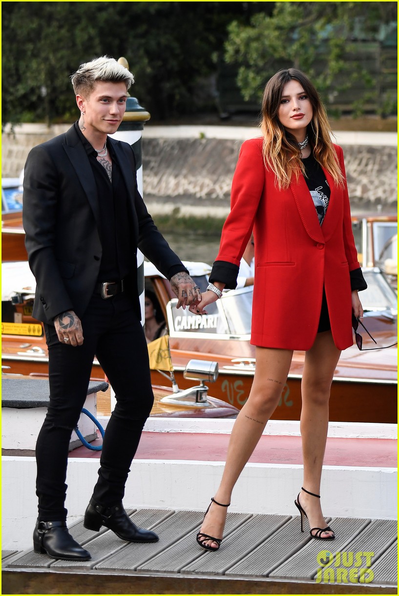 Full Sized Photo of bella thorne suits up for venice film festival with