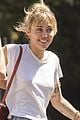 miley cyrus wraps her arms around kaitlynn carter during afternoon outing 01