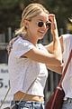 miley cyrus wraps her arms around kaitlynn carter during afternoon outing 03