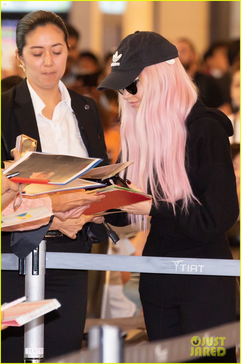 Dove Cameron Rocks Pink Hair While Arriving in Japan Photo 1258281 Photo Gallery Just
