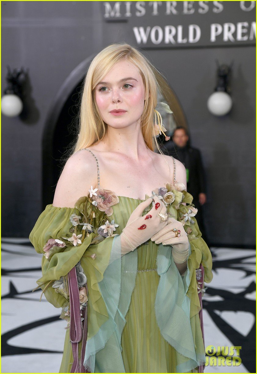elle fanning accessorizes green gown with blood drops at maleficent 2 world premiere 10