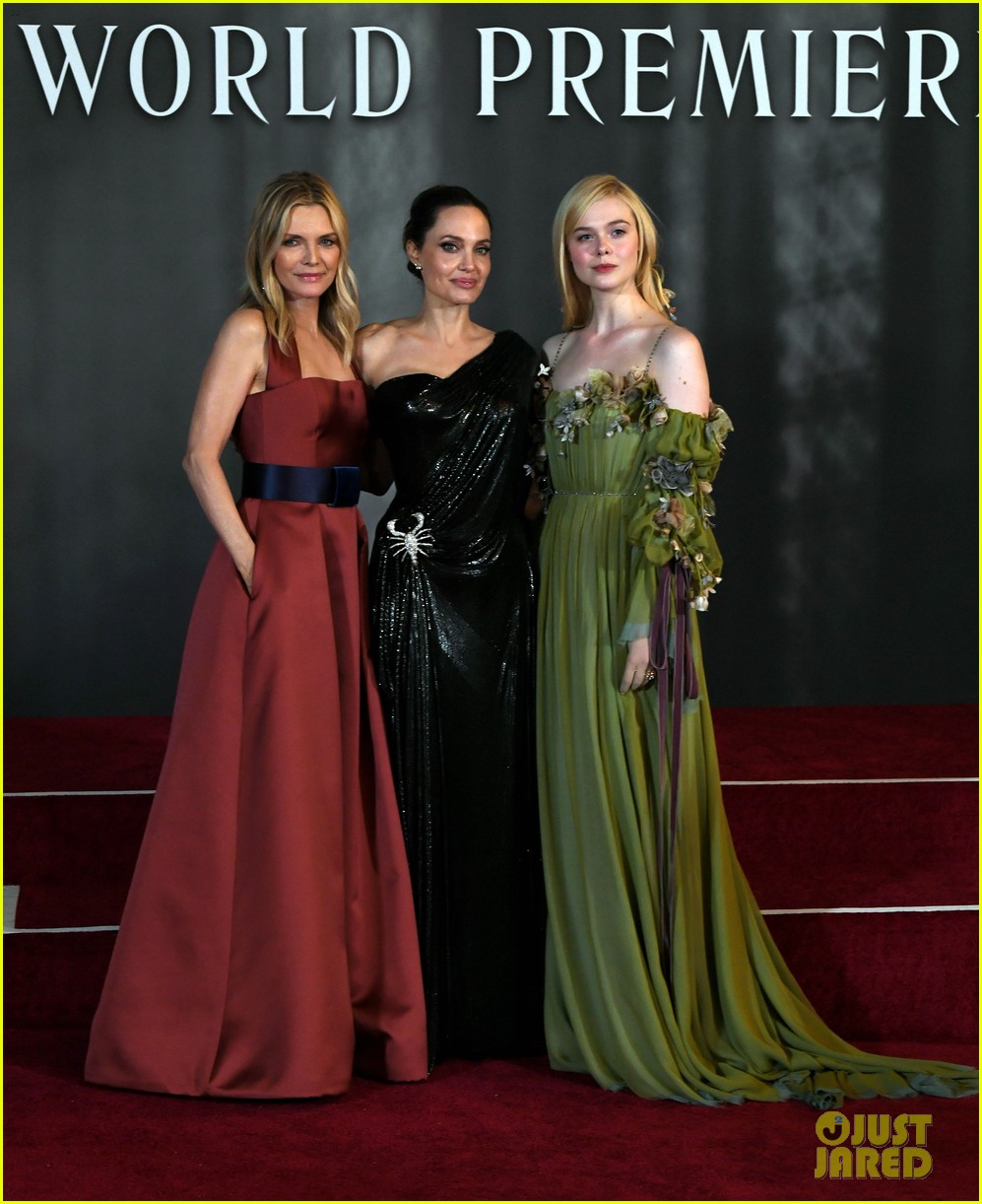 elle fanning accessorizes green gown with blood drops at maleficent 2 world premiere 13
