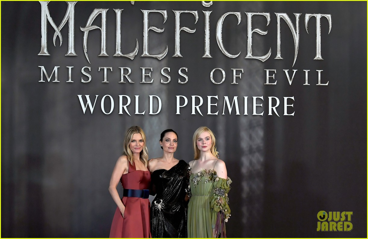 elle fanning accessorizes green gown with blood drops at maleficent 2 world premiere 18