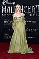 elle fanning accessorizes green gown with blood drops at maleficent 2 world premiere 01