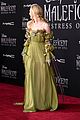 elle fanning accessorizes green gown with blood drops at maleficent 2 world premiere 07