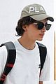 timothee chalamet venice airport arrival pics 01