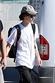 timothee chalamet venice airport arrival pics 03