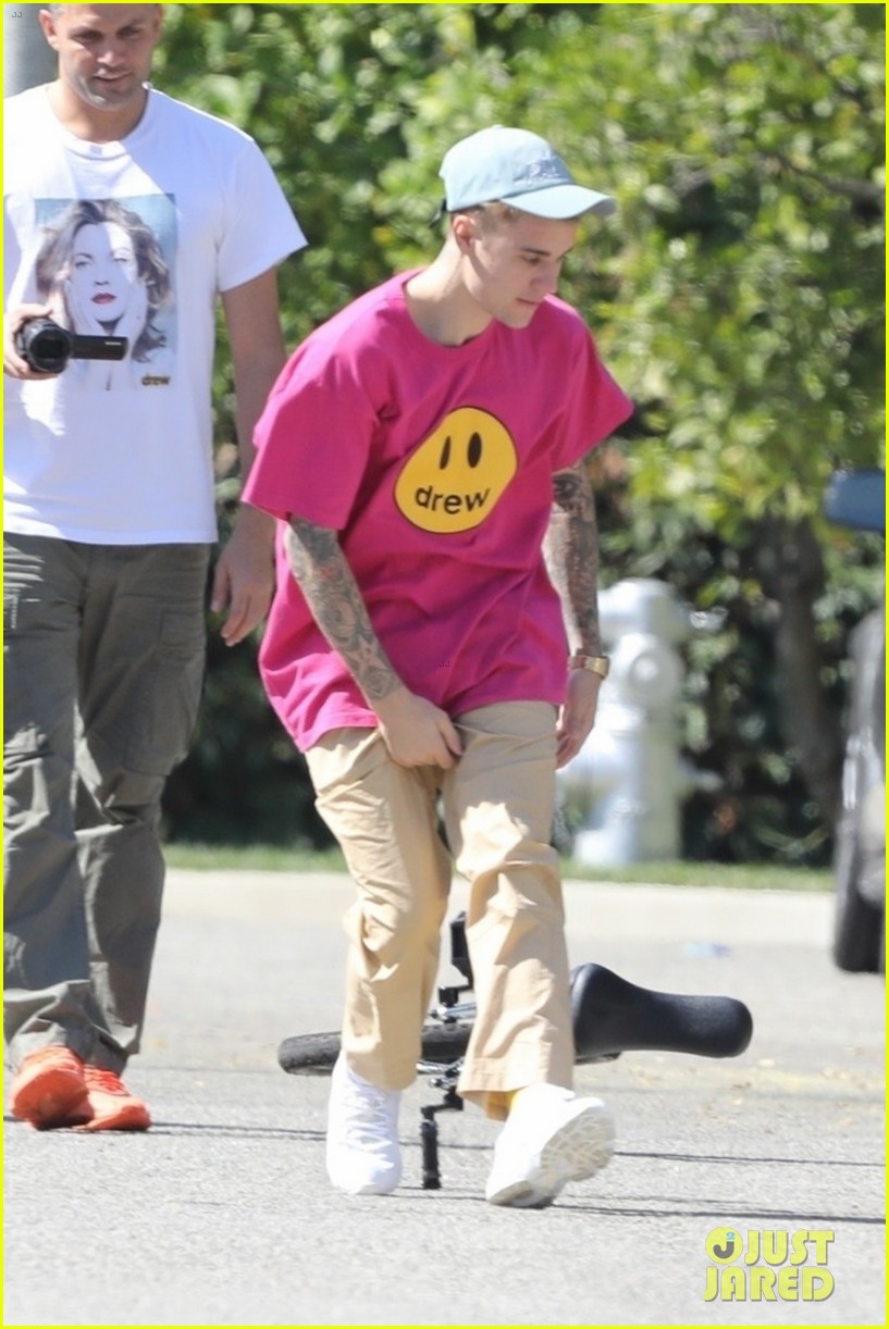 Justin Bieber Takes a Spill on His Unicycle, But Gets Right Back Up ...