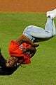 simone biles does backflip before throwing first pitch at world series game 06