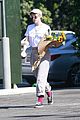 kristen stewart picks up a bouquet of sunflowers while out in la 05