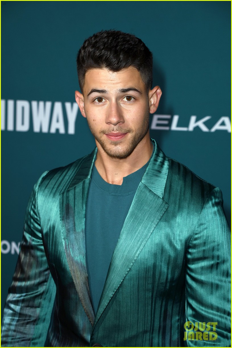 Full Sized Photo of nick jonas sports silk teal suit for midway ...