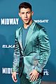 nick jonas sports silk teal suit for midway premiere 05