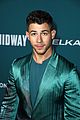 nick jonas sports silk teal suit for midway premiere 12