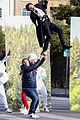 harry styles zip lines over la street for late late show segment 09