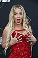 tana mongeau sparkles in red at peoples choice awards 02