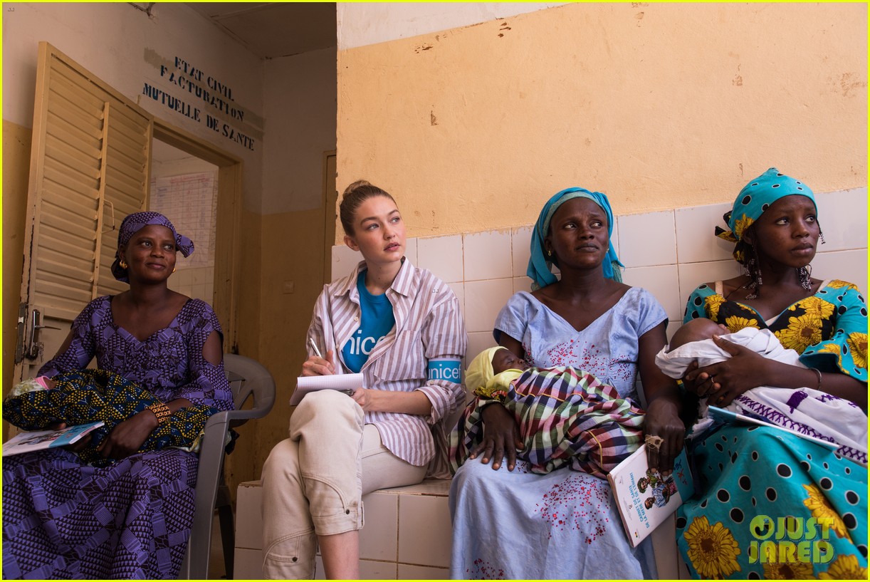 gigi hadid unicef senegal visit yellow track suit 08