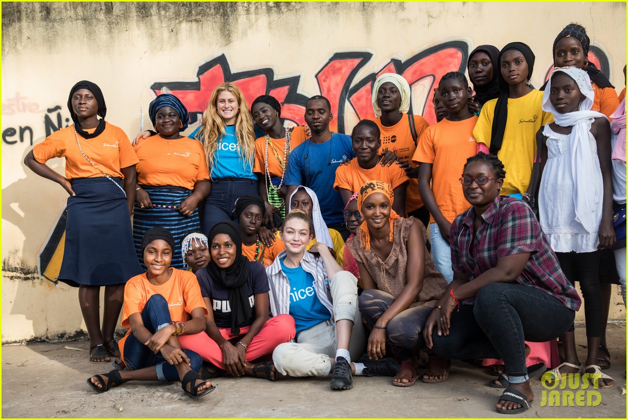gigi hadid unicef senegal visit yellow track suit 09