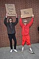 justin bieber with dude with sign 03