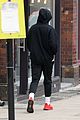 harry styles bundles up for a jog in london 02