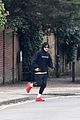 harry styles bundles up for a jog in london 03