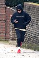 harry styles bundles up for a jog in london 04