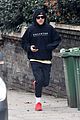 harry styles bundles up for a jog in london 05