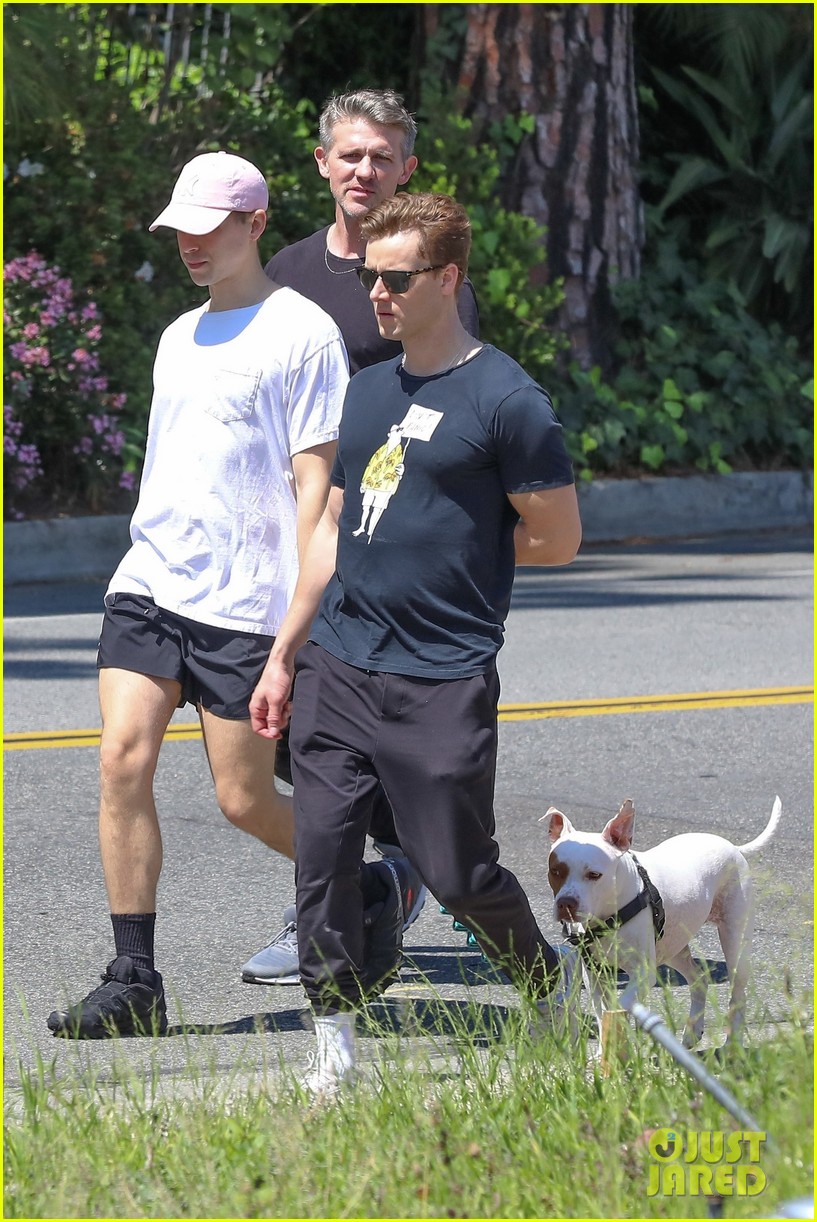 tommy dorfman takes his dog for a walk with friends 04