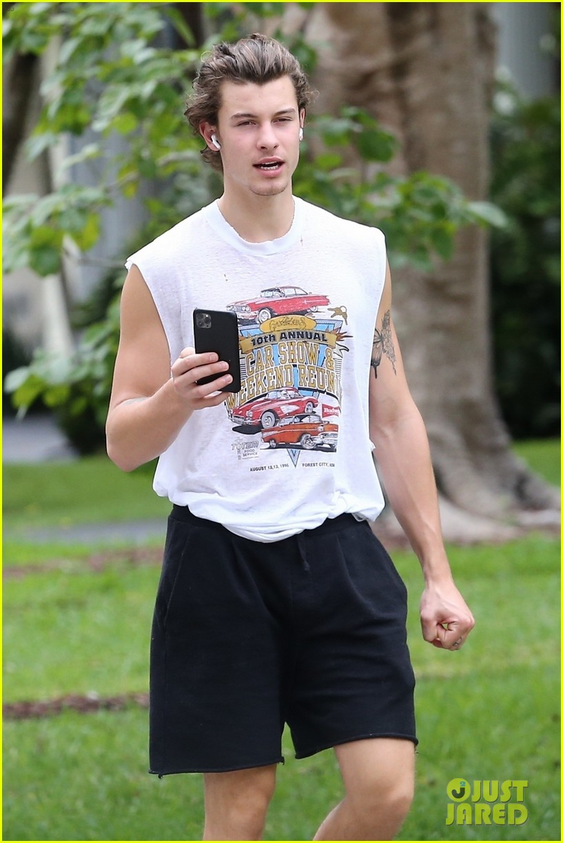 shawn mendes takes a call during his neighborhood stroll 05