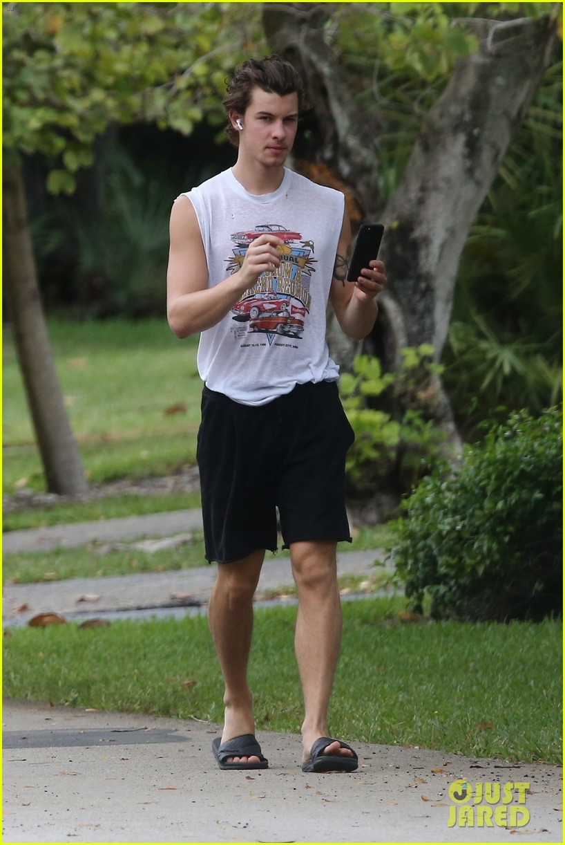 shawn mendes takes a call during his neighborhood stroll 09