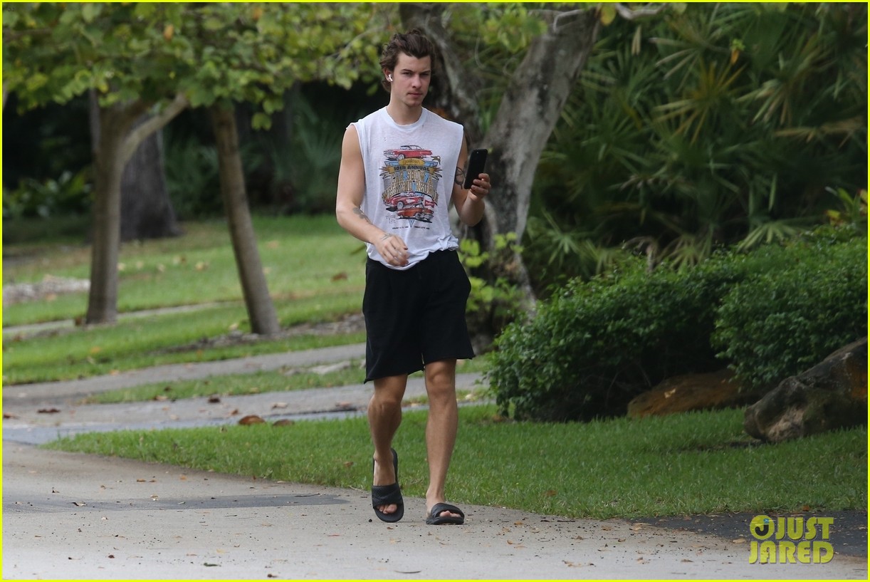 shawn mendes takes a call during his neighborhood stroll 10