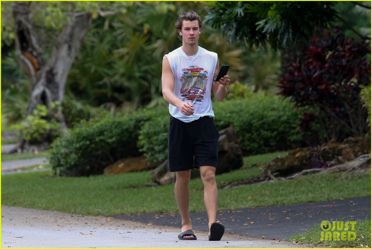 shawn mendes takes a call during his neighborhood stroll 11