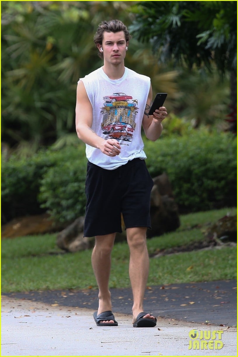 shawn mendes takes a call during his neighborhood stroll 12