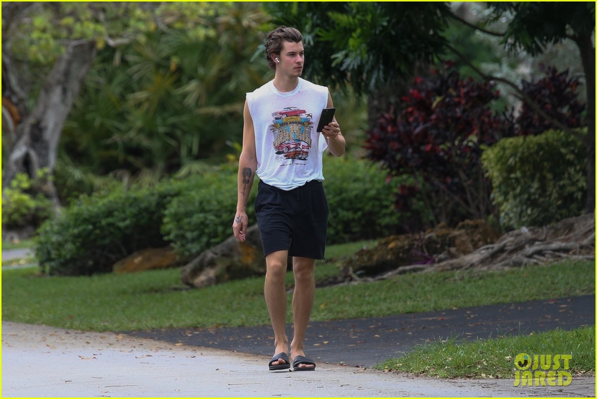 shawn mendes takes a call during his neighborhood stroll 13