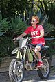 kj apa learns how to ride a dirt bike with alex fines help 22