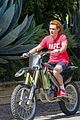 kj apa learns how to ride a dirt bike with alex fines help 23