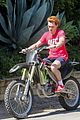 kj apa learns how to ride a dirt bike with alex fines help 24