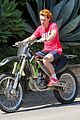 kj apa learns how to ride a dirt bike with alex fines help 25