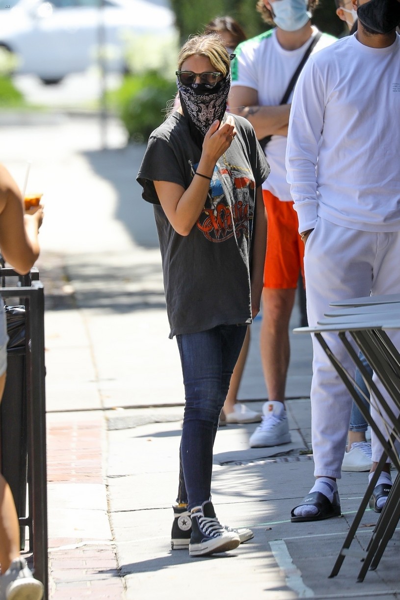 Ashley Benson Wears a Bandana Mask While Picking Up Food To Go in LA