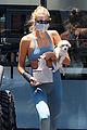 kaia gerber blue look carrying puppy 04