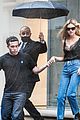 brooklyn beckham at his moms store with nicola peltz 07