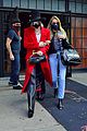 miley cyrus tophat red coat leaving hotel mom nyc 03