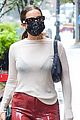 kourtney kardashian umbrella holder addison rae 04