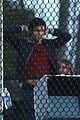 kj apa pulls casey cott in for a kiss on riverdale set 27